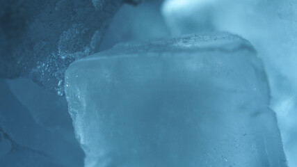 Abstract extreme macro closeup photo of frozen ice cubes as seen inside a freezer