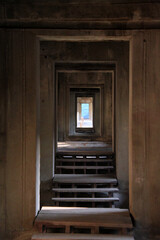 Fototapeta na wymiar Colonnade inside the temple of Angkor Wat, Cambodia 