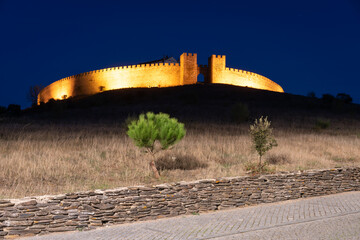 Arraiolos village castle with lights at night in Alentejo, Portugal