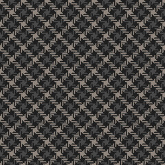 Abstract textile plaid pattern in dark grey for dress, jacket, coat. Seamless dog tooth check plaid graphic art for autumn winter casual everyday fashion textile print. Hounds tooth texture.