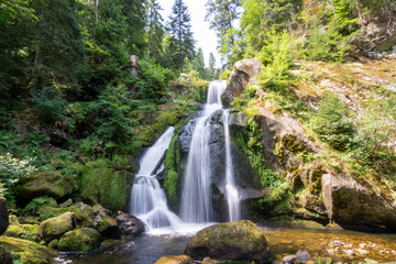 the cascades of the waterfall near Triberg. a beautiful waterfall in the black forest - obrazy, fototapety, plakaty
