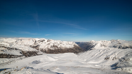 snowy Pyrenees mountains in winter, on the border between Andorra and France. - 414192460