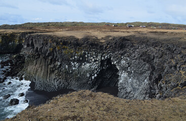 Basalt Column Cavern with Black Sand Beach in Iceland