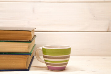 Old vintage books and cup