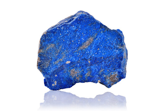Macro shoot of piece of raw uncut Blue Lapis Lazuli Mineral stone from Afghanistan isolated on white background. Closeup photo of amazing rare Lazurite specimen mineral rough.