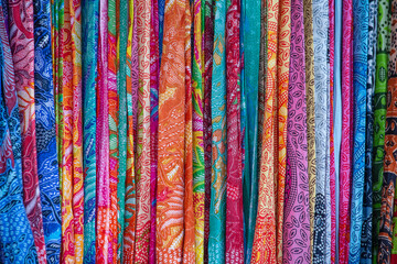 Colorful balinese cloth for sale in street market in Ubud, Bali, Indonesia, Asia.