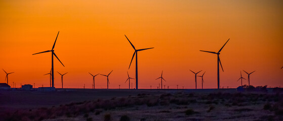 Wind turbines at sunset in the state of Idaho, Scenic view of wind turbines power generator