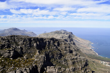 Fototapeta na wymiar Mountains, the sea and Cape Town. Picture taken from the top of Table Mountain, Cape Town, South Africa.