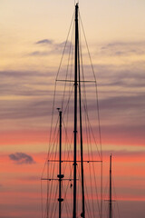 Caribbean, Grenada, Saint Vincent. Sailboat mast at sunset.