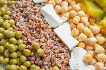 Food bowl with chickpeaks. Health dinner. Vegetarian cooking cuisine. Cafe organic meal. Fresh lunch with pumpkin and feta cheese. Detox spicy. Above view. Flatlay. Closeup
