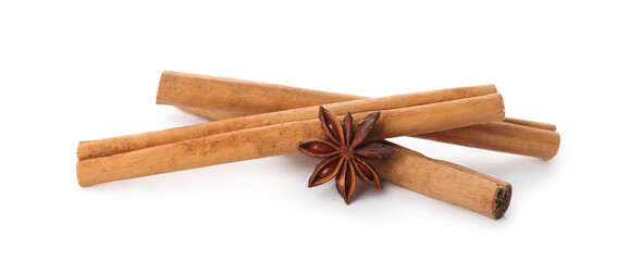 Aromatic cinnamon sticks and anise isolated on white