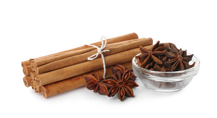 Aromatic cinnamon sticks and anise isolated on white