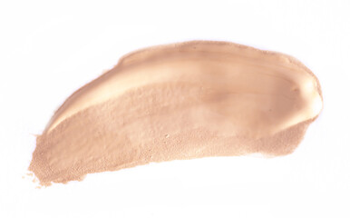 Foundation smear on a white background. A speck of makeup isolated.
