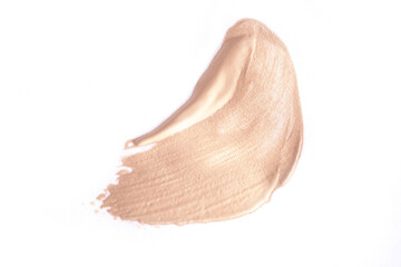 Foundation smear on a white background. A speck of makeup isolated.
