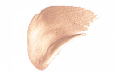 Foundation smear on a white background. A speck of makeup isolated.