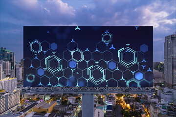 Information flow hologram on road billboard, night panorama city view of Bangkok. The largest...