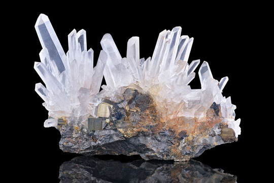 Amazing pure Quartz Crystal cluster gemstone closeup macro isolated on black background. Natural rare white mineral rough stone. Beautiful crystals arrangement