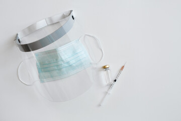 Personal protective equipment for coronavirus and viral infections.  Mask and face shield on a...