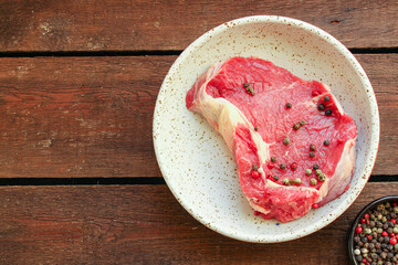 steak fresh beef raw meat portion on the table healthy meal snack outdoor top view copy space for text food background rustic image