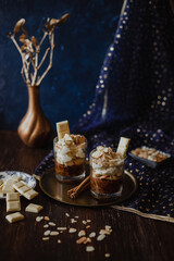 Fototapeta premium Valentine's Day vegetarian dessert - carrot cake with roasted almonds, white chocolate, cinnamon and mascarpone chesse
