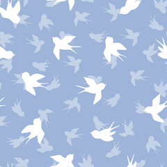 Seamless pattern with white swallow silhouette on blue background. Cute bird in flight. Vector illustration. Doodle style. Design for invitation, poster, card, fabric, textile