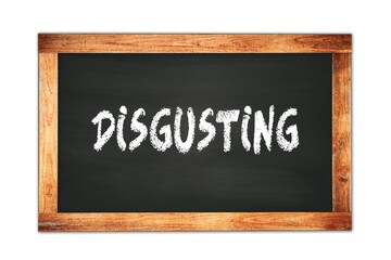 Obraz premium DISGUSTING text written on wooden frame school blackboard.
