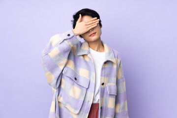Young Vietnamese woman with short hair over isolated background covering eyes by hands. Do not want to see something
