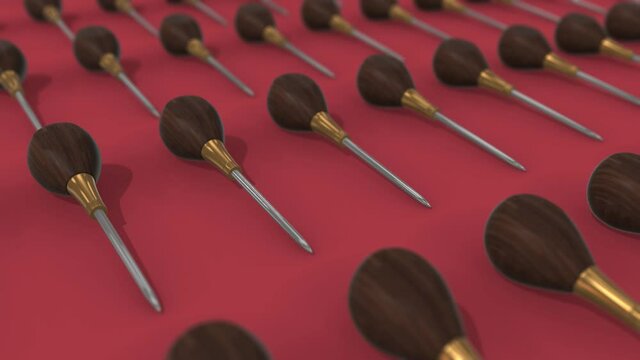 Multiple Scratch Awls with wooden handle in a row 4k. High quality 4k footage