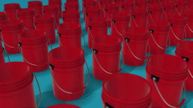 A lot of Red Buckets in a blue background 4k. High quality 4k footage