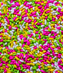 background of candy, colorful candy sprinkles, colorful candy background