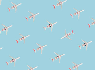 white a plane on pastel blue background. Minimal flat lay. retro style.
