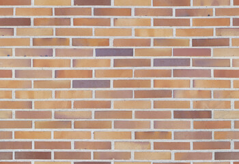 Brick red wall. background of a old brick house. Seamless texture. Perfect tiled on all sides.