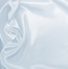 Smooth elegant grey silk or satin luxury cloth as wedding background. Luxurious background design