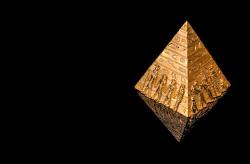 Golden pyramid with hieroglyphs on a black  background
