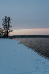 partial frozen lake in winter