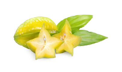 Fototapeta premium Cut and whole carambolas with green leaves on white background