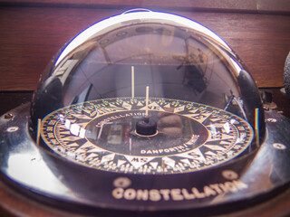 Large ornate constellation compass in the wheelhouse of a cannery ship in Bristol Bay Alaska.  