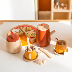 wooden kids tea set. Set of images of happy cheerful young children