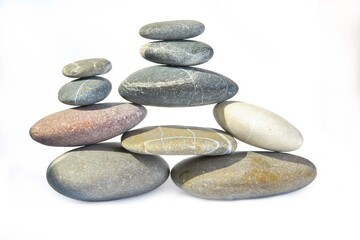 Pyramid of stones on a white background