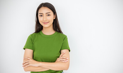 Attractive beautiful positive asian woman - close up portrait asian nerdy girl. Portrait of pretty nerd Japanese asia lady wearing green t shirt with smile isolated on white background.