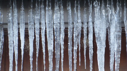 Icy candles hanging from the roof