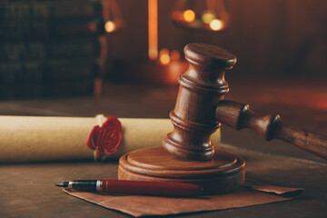 Wooden gavel, envelope and testament. Notary public office.