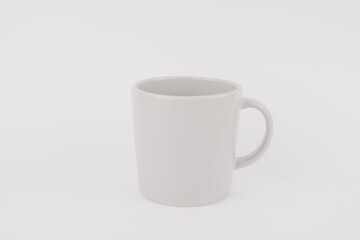 empty new gray cup on white background