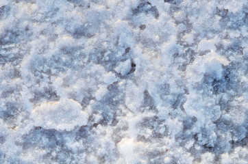 lake very beautiful white salt crystals on blue water background nice background