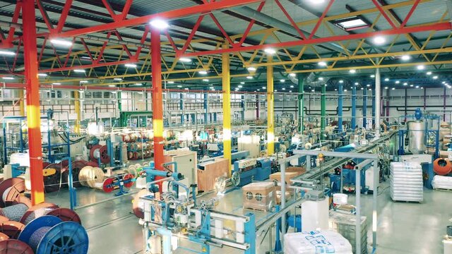 Modern cable manufacturing plant in daylight. Cables, wires manufacturing plant.