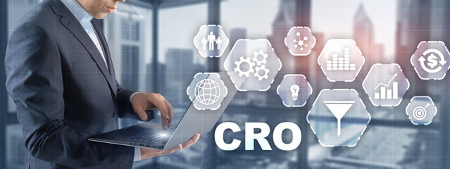 Businessman presses Conversion Rate Optimization On Virtual Screen