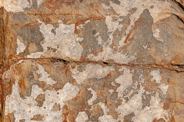 Abstract background from natural stones close-up. Stone structure background close-up. Natural granite stone for laying on the floor.