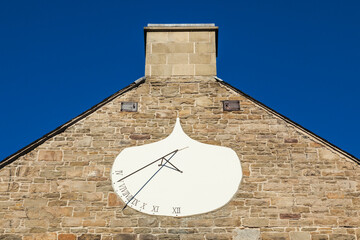 Canada, Central New Brunswick, Fredericton. Garrison Quarter's old barracks with sundial clock.