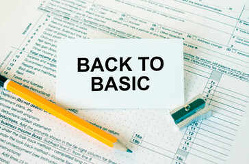 Obraz premium Business card with text Back To Basic on financial docs