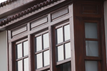 Window of old building close up. Traditional Ottoman style wooden architecture. Historical building at turkish town.